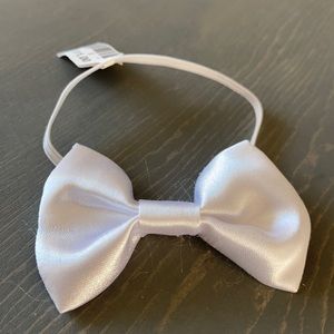 White satin small dog 6 1/2” bowtie. Brand new.